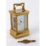 A Matthew Norman miniature carriage clock, the gilt brass case with fluted columns to the corners,