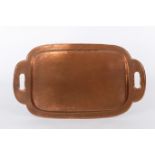 A Newlyn School rectangular copper tray with pierced handle to each side, 73.