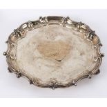 A silver salver, Mappin & Webb, Sheffield 1905, with presentation inscription, 38cm diameter,