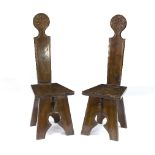 A pair of Italian walnut hall chairs, 19th Century,