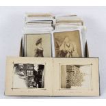 A quantity of late 19th Century photographs, portrait groups, topographical, etc.