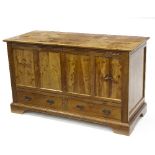 A pine mule chest with hinged cover and two drawers,
