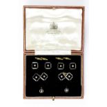 An Art Deco diamond and onyx gentleman's dress set, comprising a pair of cufflinks,