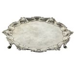 A George II silver salver, Dorothy Mills, London 1752, with shell & scroll border,