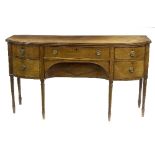 A George IV bowfront mahogany sideboard, on turned legs,