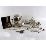 A silver plated chafing dish, crested, of globe form, a plated toast rack, tea set etc.