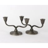 A pair of pewter two-branch candlesticks by Just Andersen,