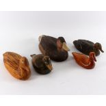 Five wooden decoy ducks,