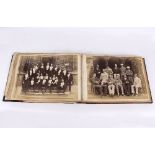 A Victorian photograph album with half leather bound bindings, gilt tooled W Playne 1880-1902,