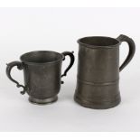 A pewter loving cup and a quart pewter mug,