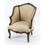 A French walnut framed armchair with upholstered back and seat,