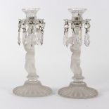 A pair of glass lustres by Baccarat, each with figure frosted column on reeded circular base,