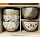 Five Japanese cups and saucers in a fitted box marked Koransha,