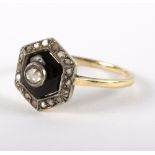 An Art Deco diamond and onyx ring,