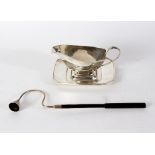 A silver sauce boat and plated stand, 1940, retailed by The Alex Clarke Company Ltd,