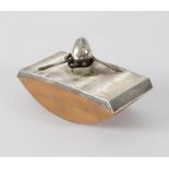 A novelty silver blotter modelled with Humpty Dumpty in a rowing boat, Birmingham 1987, 10.