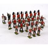 A quantity of Britains painted lead figures to include uniformed marching band,