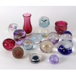 A group of various paperweights to include Caithness and two ruby glass art vases
