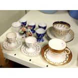 A pair of Bloor Derby egg cups and stands, two tea bowls and saucers, a tea cup and saucer,