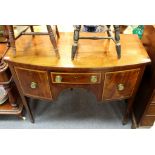 A Regency bowfront sideboard, fitted single drawer and two deep drawers on square tapering legs,