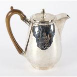 A George III silver coffee pot, London 1799, of tapering baluster form, engraved an armorial,