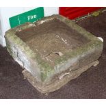 A rectangular stone trough,