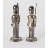 A pair of novelty silver condiments, CS and FS, Chester 1901/1906, modelled as guardsmen,