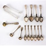 A pair of George III bright-cut silver sugar nips, TE, London circa 1790, and various teaspoons,