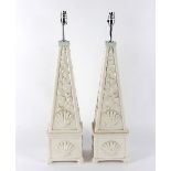 A pair of Casa Pupo white glaze lamps of obelisk shape with moulded shell decoration,