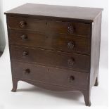 A George III mahogany secretaire, with fitted drawer and three drawers beneath,