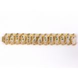 An 18ct gold bracelet of modern design,