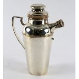 A Harrods silver plated cocktail shaker, with corked stopper, spout and handle,