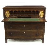 An early Regency mahogany secretaire with fitted interior,