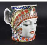 A Soviet porcelain jug, Lomonosov factory, modelled as a girl in traditional dress,