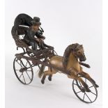 A Victorian style model carriage with figure and horse,