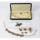 A single strand cultured pearl Mikimoto necklace, cased,