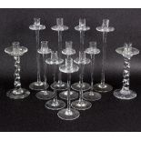 A pair of glass candlesticks, the columns of rope twist form,