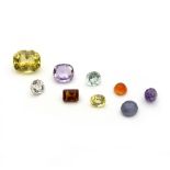 A group of loose gemstones, with original purchase receipt from Louis Siedle, Colombo ,