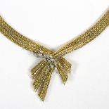 An 18ct gold and diamond necklace,