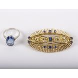 A sapphire mounted brooch and a sapphire dress ring,