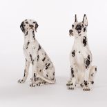 A floor standing ceramic model of a Dalmatian and another similar,