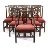 A harlequin set of George III style dining chairs, each with interlaced splat back,