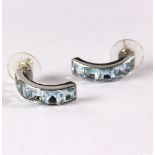 A pair of blue topaz earrings,