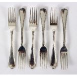 A set of six George IV silver dessert forks, William Chawner, London 1823, with reeded borders,