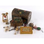 An early 20th Century wooden horse and carriage and various other wooden toys in a painted casket
