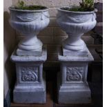 PAIR OF CONCRETE PLANTERS