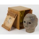 Japanese Haniwa style head of a girl, made of clay, in a kiri box with a signature and seal, approx.