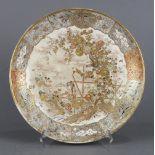 Japanese Satsuma plate, Meiji period, with chrysanthemums and birds in gilt and color, surrounded by