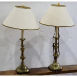 (lot of 2) Brass candlesticks converted into table lamps, each having a single light above a