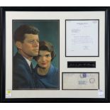 Framed John F. Kennedy commemorative ephemera, including a 1957 document and envelope, possibly